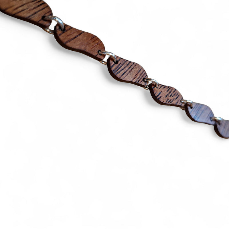 Ambachtelijke TimberRing armband van merbau en zilver met rijke tekening in het hout