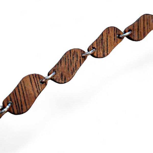 Houten timberring armband van merbau met zilveren oogjes, gemaakt van resthout